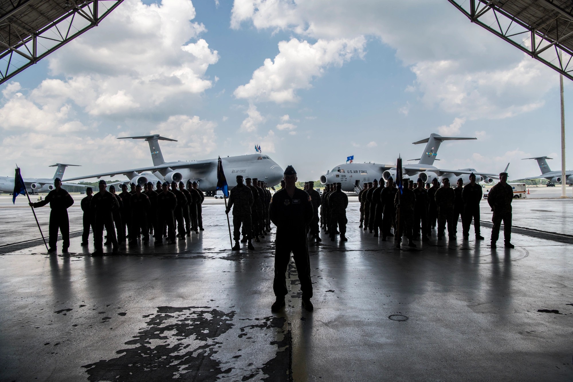 U.S. Air Force personnel stand in silhouette formation during a change-of-command ceremony at Dover Air Force Base, Delaware